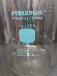Corning Solution Bottle Pyrexplus Coated 13.25 With Tooled Neck. Fixed Price $420.00.