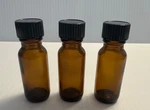 Boston Round 1/2 Oz Amber Glass Bottles With Poly Lined Black Caps. Fixed Price $123.95.