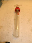 Aldrich Two-piece Vacuum Trap, Hose Barbs At 90 Broken Inner Glass. Fixed Price $75.00.