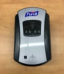 New Purel / Gojo LTX-7 Touch-free Dispenser, Black Hands Free, 700ML, 1328-04. Fixed Price $51.39.
