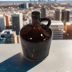 Vintage Amber Glass Liquor Jug 1/5 Quart D-23 Mark W/ Metal Cap No Federal Law. Fixed Price $39.99.