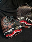 Sprayground Sharks In Paris Checkered Mouth Backpack & Duffle Bag Set-rare. Fixed Price $220.00.