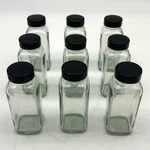 4 Oz Clear Glass French Square Bottles W/ Black Caps Berlin Packaging 117191 9PK. Fixed Price $20.45.