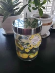 American Atelier Glass Storage Jar 7 Inch Lemon Floral Design Metal Lid Cylinder. Fixed Price $14.99.